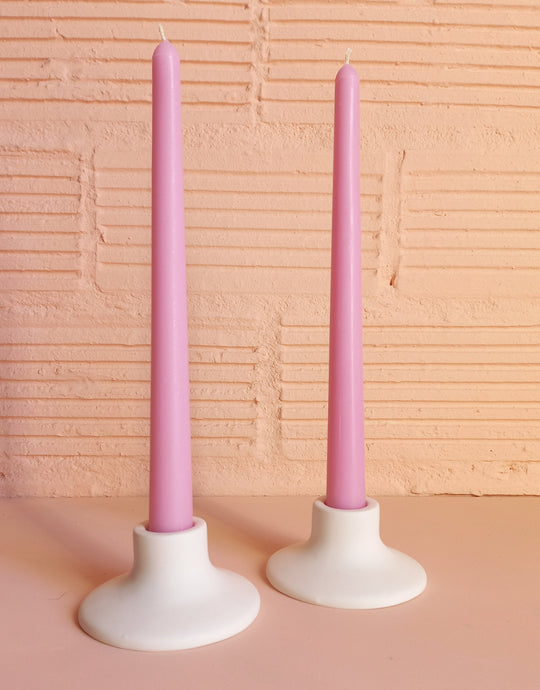 Pink tapered dinner candles