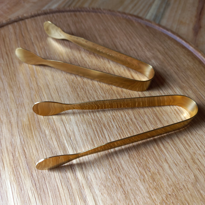 set of 2x small gold ice tongs