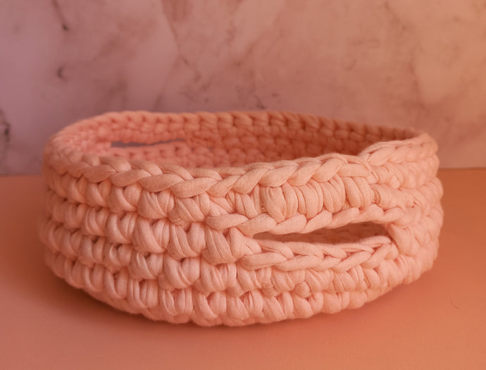 Pale pink crochet basket