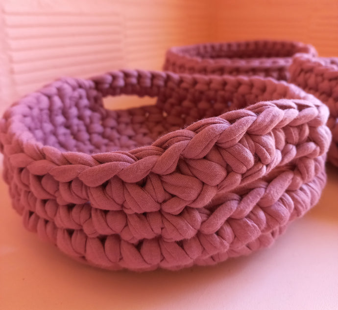 dark pink crochet basket with handles