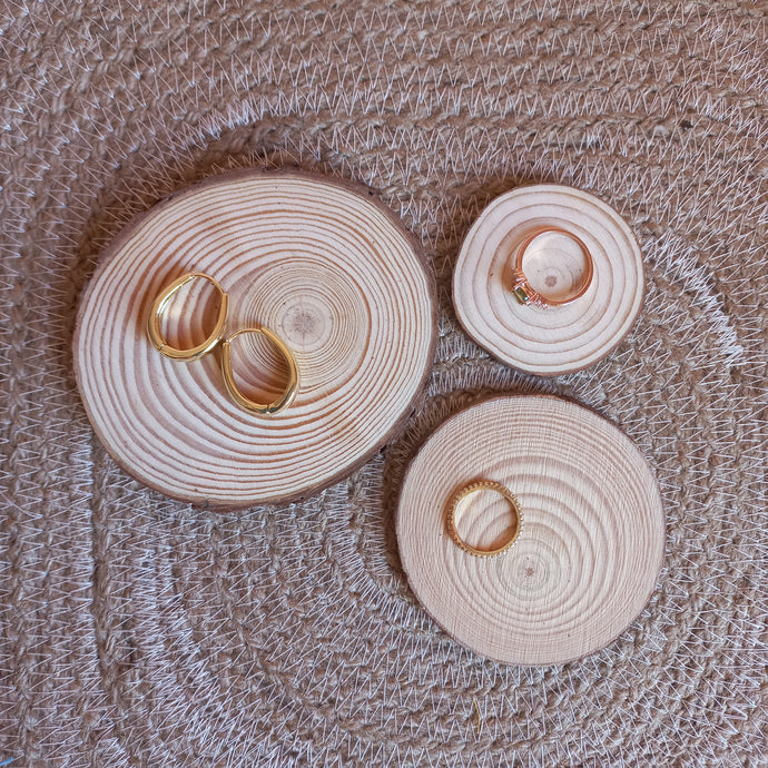 Set of three wooden coasters with bark edge