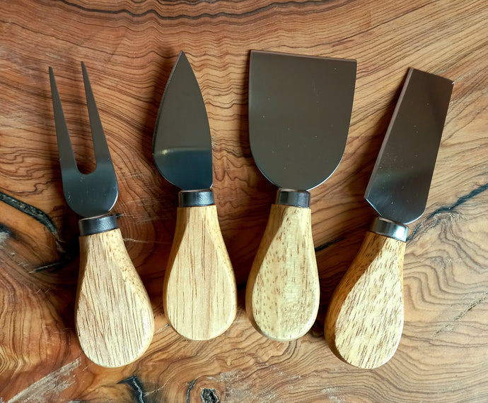 Four piece cheese set with Bamboo short handes and steel blades