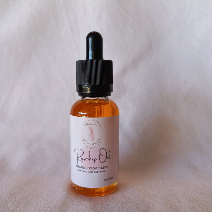 Rosehip oil in glass bottle with dropper