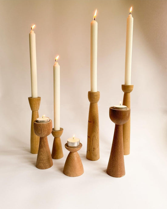Assortment of turned modern wooden candlesticks